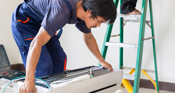 technician-man-installing-air-conditioning-client-house-repairman-