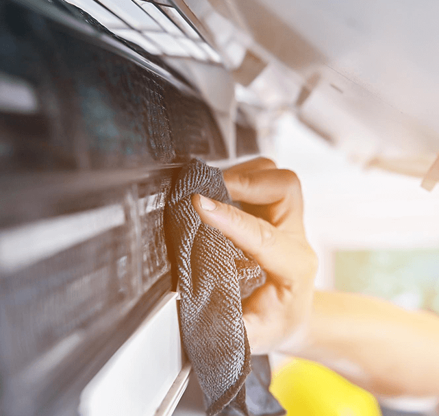 rag-wiping-aircon-for-cleaning